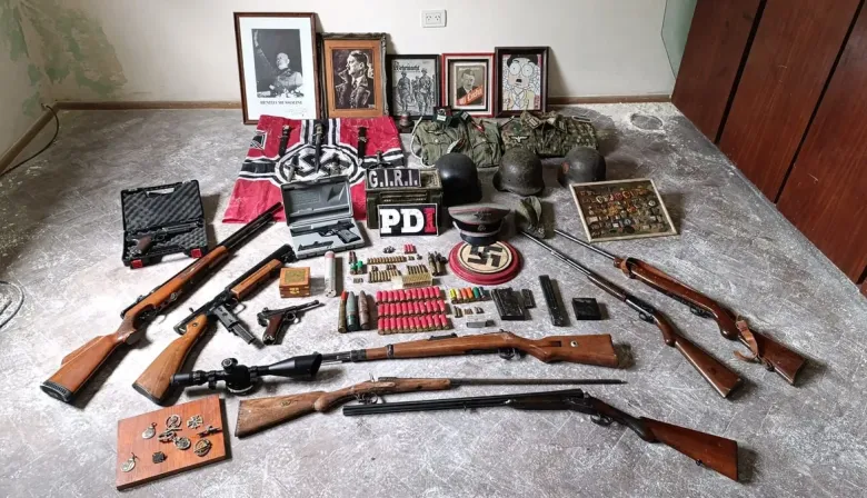 Hallaron un arsenal y simbología nazi en un allanamiento por un arma robada